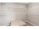 Spacious walk-in closet with carpet flooring and wire shelving at 5518 Flame Vine Way, St Cloud, FL 34771