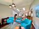 Bright living room featuring modern lighting, vaulted ceilings, and stylish decor at 5724 Pitch Pine Dr, Orlando, FL 32819