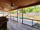 Relaxing screened patio with wood ceiling, and a view of a pool and backyard at 5724 Pitch Pine Dr, Orlando, FL 32819