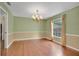 Well-lit dining area with decorative chandelier, and ample natural light at 603 S Sweetwater Blvd, Longwood, FL 32779
