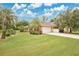 Charming brick home with a well-manicured lawn and inviting curb appeal at 603 S Sweetwater Blvd, Longwood, FL 32779