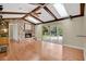 Spacious living room features a fireplace and sliding glass doors to the outdoor patio at 603 S Sweetwater Blvd, Longwood, FL 32779