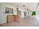 Covered outdoor patio with tiled flooring, serving bar and outdoor view with lots of natural light at 603 S Sweetwater Blvd, Longwood, FL 32779
