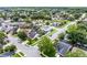 Aerial view of a residential neighborhood showcasing diverse homes with lush landscaping and well-maintained streets at 754 Birgham Pl, Lake Mary, FL 32746