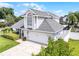 Charming home with a two-car garage, a well-maintained yard, and beautiful surrounding greenery at 754 Birgham Pl, Lake Mary, FL 32746