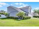 Charming home with a well-maintained yard, mature trees, and an attached two-car garage at 754 Birgham Pl, Lake Mary, FL 32746