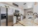 Kitchen featuring stainless steel appliances, granite countertops, and bright white cabinetry at 754 Birgham Pl, Lake Mary, FL 32746