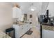 Spacious kitchen featuring granite countertops, stainless steel appliances, and ample storage space at 754 Birgham Pl, Lake Mary, FL 32746