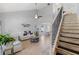 Spacious living room with high ceilings, hardwood floors, and an open floor plan at 754 Birgham Pl, Lake Mary, FL 32746