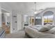 Comfortable main bedroom with high ceilings, carpet floors, and a sun-drenched window view at 754 Birgham Pl, Lake Mary, FL 32746
