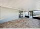 Spacious screened-in patio with brick pavers and access to the backyard at 7911 Murcott Cir, Orlando, FL 32835