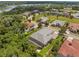 Beautiful aerial view of the neighborhood, showcasing lush greenery and stunning lake views at 8080 Peaceful Cir, Sanford, FL 32771