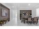 Elegant dining room with modern decor, stylish chairs, and tile flooring throughout at 8080 Peaceful Cir, Sanford, FL 32771
