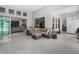 Bright living room with a sofa set and an oversized sliding glass door at 8080 Peaceful Cir, Sanford, FL 32771