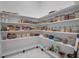 Organized walk-in pantry with floor-to-ceiling shelving filled with canisters, jars, and kitchen supplies at 8080 Peaceful Cir, Sanford, FL 32771
