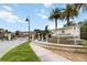 Community entrance with fountain, The Fountains sign, and meticulously landscaped grounds at 8219 Roseville Blvd, Davenport, FL 33896