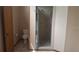 Bathroom featuring a separate toilet area and walk-in shower at 900 Red Fox Rd, Altamonte Springs, FL 32714