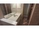 Bathroom with long vanity, sink, mirror, and tile floor at 900 Red Fox Rd, Altamonte Springs, FL 32714