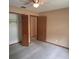 Bedroom with open closet and ceiling fan at 900 Red Fox Rd, Altamonte Springs, FL 32714