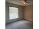 Bedroom with window and carpet at 900 Red Fox Rd, Altamonte Springs, FL 32714