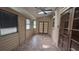 Bright sunroom with tiled flooring and multiple windows at 900 Red Fox Rd, Altamonte Springs, FL 32714