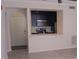 Modern kitchen showcasing stainless steel appliances, a breakfast bar, and a convenient layout at 911 N Orange Ave # 335, Orlando, FL 32801