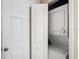 Convenient laundry closet with a stacked washer and dryer unit for in-home laundry at 911 N Orange Ave # 335, Orlando, FL 32801