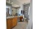 Clean bathroom featuring neutral colors, granite countertop, and an integrated sink at 1022 Calabria Ave, Davenport, FL 33897