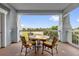 Balcony seating overlooking golf course; a perfect outdoor space for relaxing and enjoying views at 1100 Sunset View Cir # 204, Reunion, FL 34747