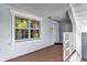 Condo entryway with window, showing a well-lit corridor with neutral tones and easy access at 1100 Sunset View Cir # 204, Reunion, FL 34747