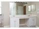 Bathroom featuring double vanity, ample lighting, and tile flooring at 1322 Reagans Reserve Blvd, Apopka, FL 32712