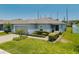 Attractive single-story house features a well-maintained lawn and two-car garage at 14357 Hidden Ct, Clermont, FL 34711