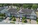 Overhead view of townhomes featuring well-kept landscaping, private driveways, and a neatly organized neighborhood layout at 150 Mitchell Creek Way, Oviedo, FL 32765