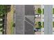 Rooftop view of townhomes showing a well-designed layout with parking areas and landscaping, perfect for modern living at 150 Mitchell Creek Way, Oviedo, FL 32765
