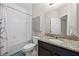 Bathroom with tub and shower combination, granite countertop, and cabinet at 150 Mitchell Creek Way, Oviedo, FL 32765