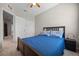 Bedroom with ceiling fan, carpeted floor, and closet at 150 Mitchell Creek Way, Oviedo, FL 32765