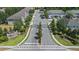Gated community entrance with manicured landscaping and tree lined streets create an inviting welcome at 150 Mitchell Creek Way, Oviedo, FL 32765