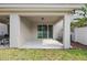 Covered patio with concrete flooring, sliding glass doors, and an open-air design for seamless indoor-outdoor living at 150 Mitchell Creek Way, Oviedo, FL 32765