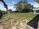 The large, open backyard with lots of sunshine is ready for your creative touch at 1506 Carmen Ave, Daytona Beach, FL 32117