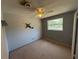 Bedroom featuring carpet floors, neutral walls, and a window that provides natural light at 1506 Carmen Ave, Daytona Beach, FL 32117