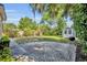 Spacious backyard with a brick patio and a charming shed offers plenty of room for outdoor activities at 1511 Chestnut Ave, Winter Park, FL 32789