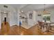 Open-concept dining area adjacent to a bright kitchen with stainless steel appliances at 1511 Chestnut Ave, Winter Park, FL 32789