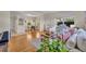 Cozy living room with hardwood floors, comfortable seating, and an adjacent dining area at 1511 Chestnut Ave, Winter Park, FL 32789