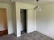 Bedroom closet features adjustable shelving for storage at 1526 Cordova Ave, Holly Hill, FL 32117