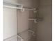 This is a walk-in closet with metal storage shelving at 1526 Cordova Ave, Holly Hill, FL 32117