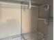 A closet provides ample storage space with wire shelving for all of your storage needs at 1526 Cordova Ave, Holly Hill, FL 32117