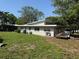 Exterior view of the home featuring its architecture and landscaping at 1526 Cordova Ave, Holly Hill, FL 32117