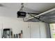 View of a well kept garage and modern LiftMaster garage door opener at 1526 Cordova Ave, Holly Hill, FL 32117