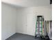 Well-maintained garage interior with painted walls and neatly stored tools at 1526 Cordova Ave, Holly Hill, FL 32117