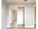 Bedroom closet featuring bi-fold mirrored doors and wire shelving at 1639 Yellow Brick Rd, Astor, FL 32102